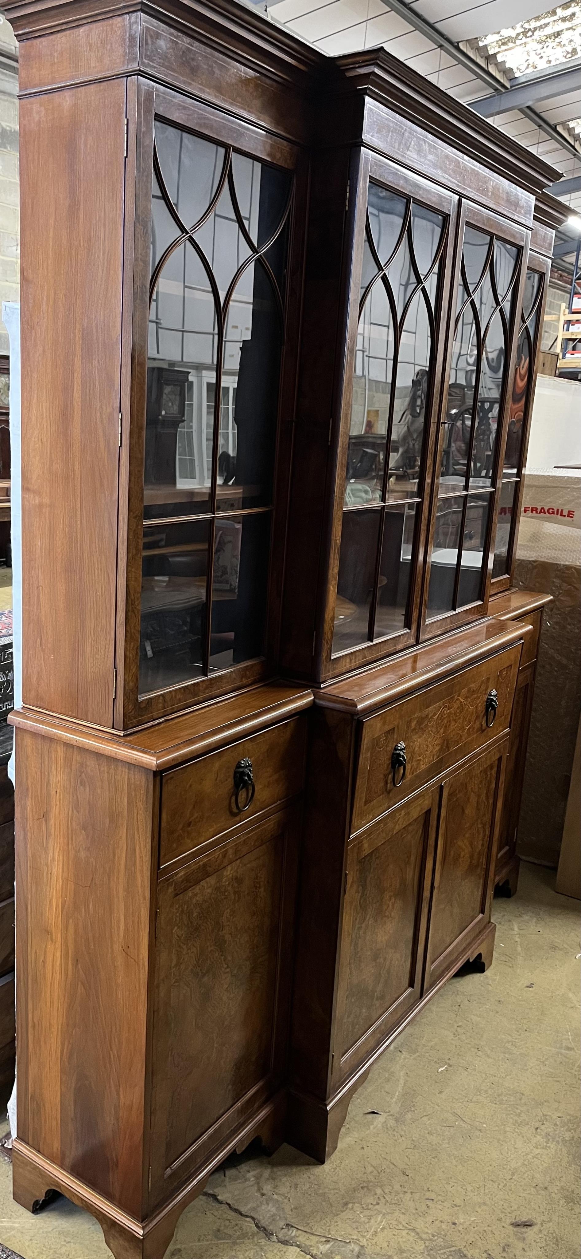 A George III design inlaid burr walnut breakfront library bookcase, width 208cm, depth 36cm, height 124cm. Condition - good